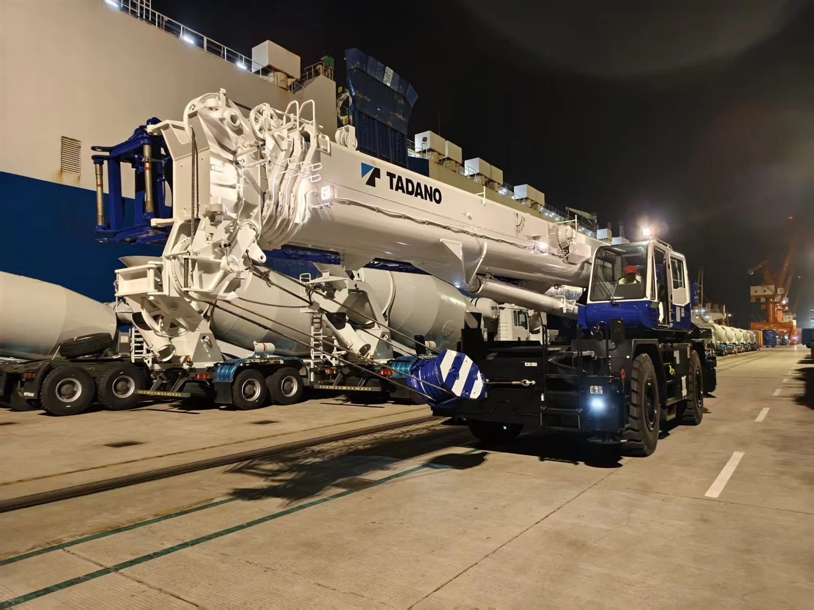 Heavy mobile crane prepared for RoRo shipping at port Heavy mobile crane prepared for RoRo shipping at port